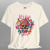 White t-shirt with a colorful skull design and text on a gray background