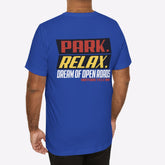 Man wearing a blue t-shirt with text on the back against a white background