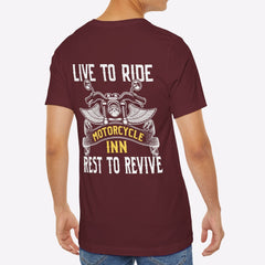 Man wearing a maroon t-shirt with motorcycle-themed text on the back