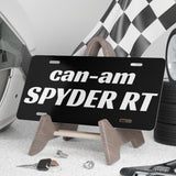 Can-Am Spyder RT license plate on a stand with helmet, tools, and checkered flag in the background.