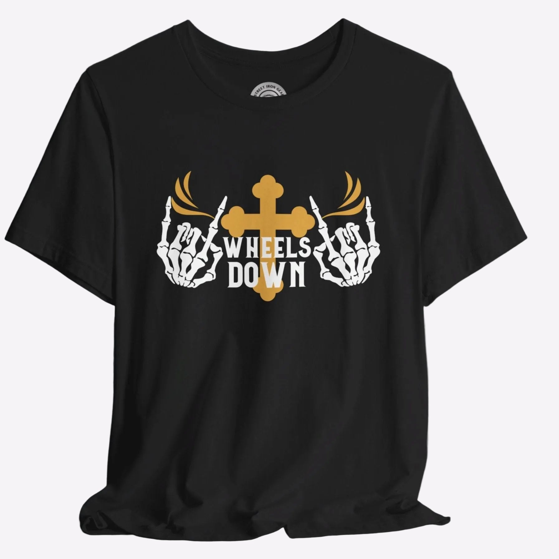 A black crew neck t-shirt with a graphic print of skeleton hands, a gold cross, and the text 'Wheels Down'.