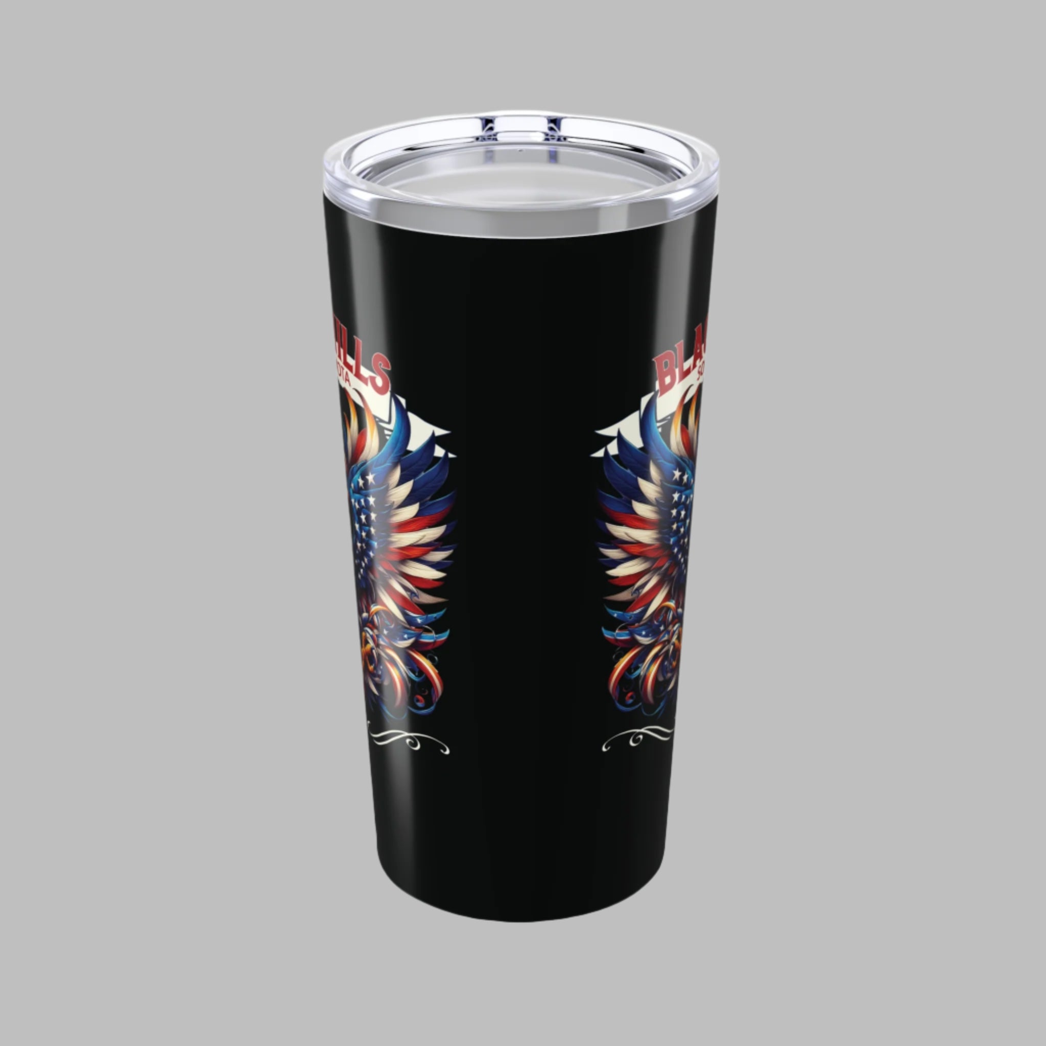 Black tumbler with colorful eagle design on a white background