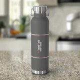 Gray water bottle with silver cap and branding on a white background