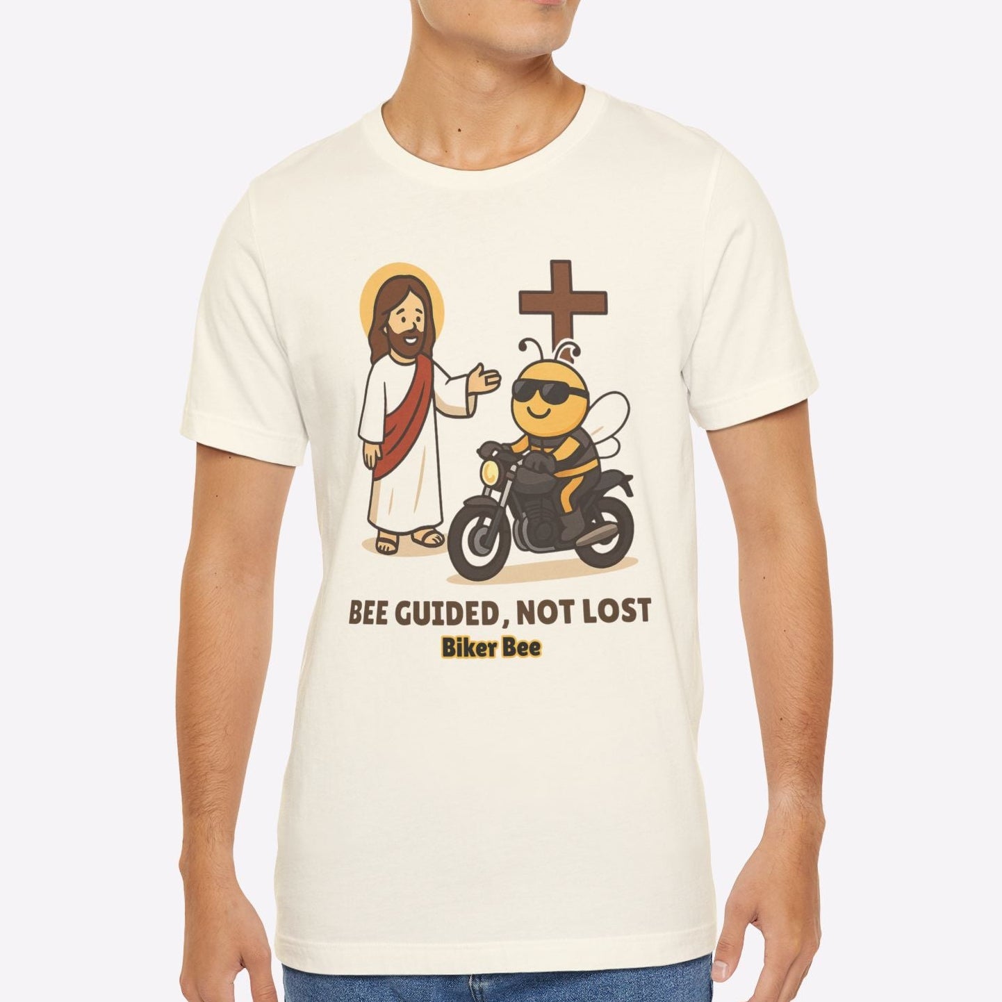 Man wearing a white t-shirt with a graphic design on a plain background