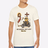 Man wearing a white t-shirt with a graphic design on a plain background