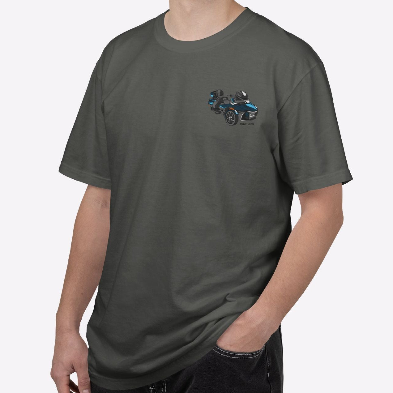 Man wearing a gray t-shirt with a graphic design on a white background