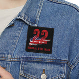 Person wearing a blue denim jacket with a patch on a white background