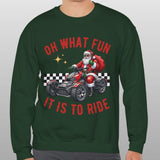 Man wearing a green sweatshirt with Santa Claus riding a motorcycle graphic and text.