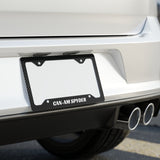 Car license plate frame with 'CAN-AM SPYDER' branding on a vehicle's rear bumper.