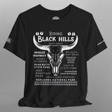 Black t-shirt with white graphic design on a gray background