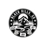 Black and white logo of Black Hills, SD with mountain and road design.