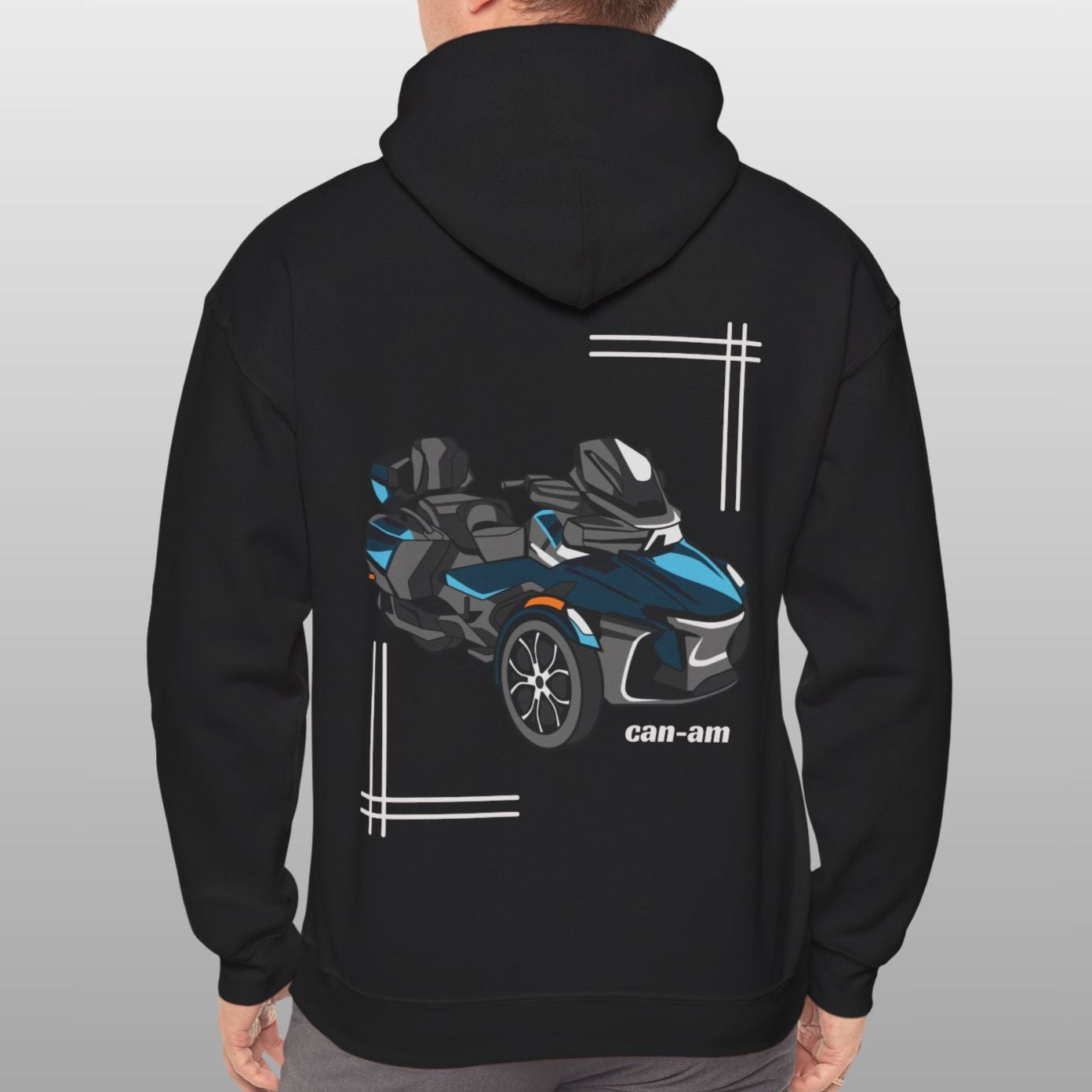 Person wearing a black hoodie with a Can-Am vehicle design on the back against a gray background