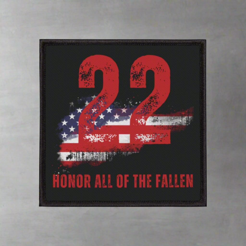 Patch with '22 Honor All of the Fallen' text and American flag design on a black background