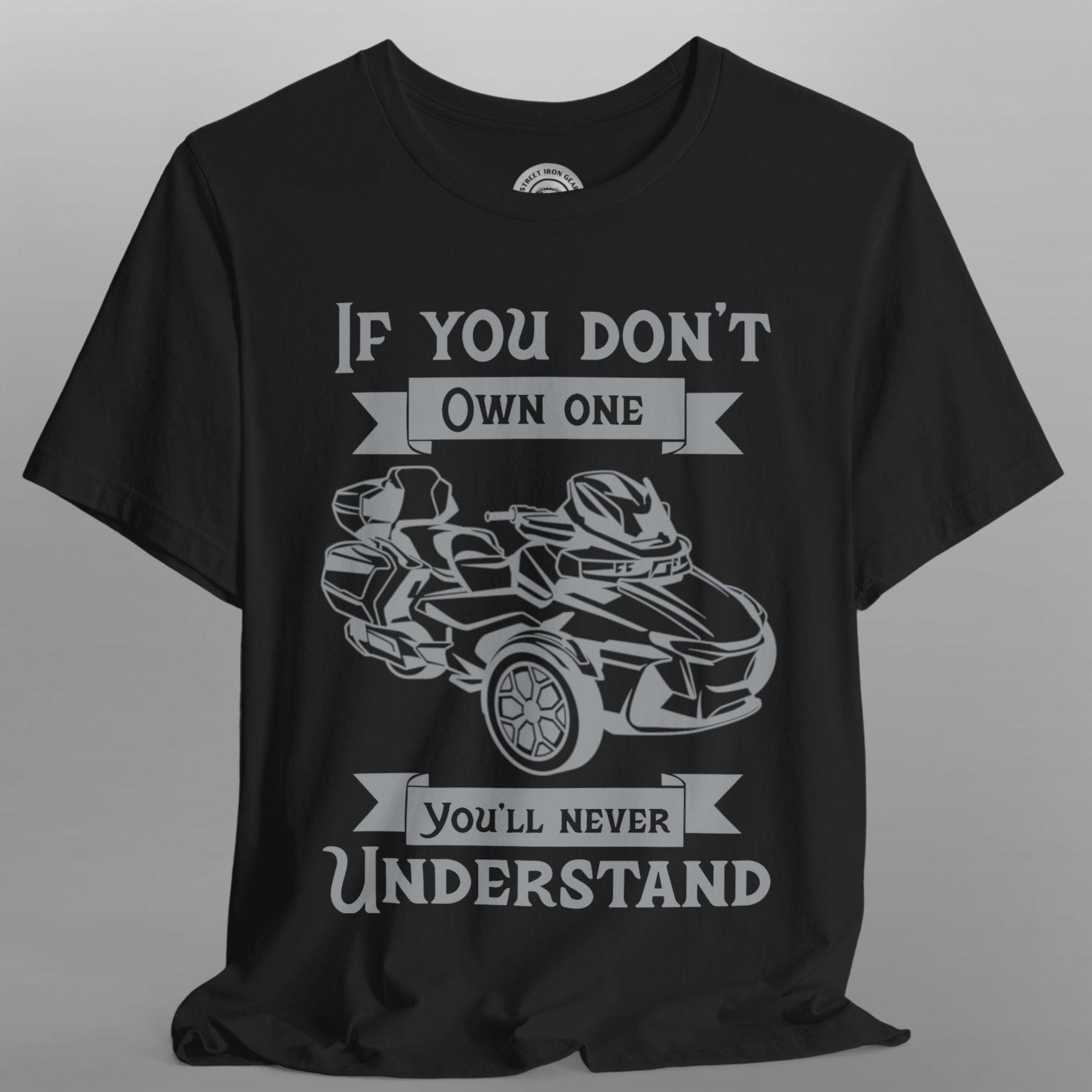 Black t-shirt with graphic of a go-kart and text on a gray background
