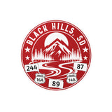 Logo of Black Hills, SD with mountain and road design on a red circle.