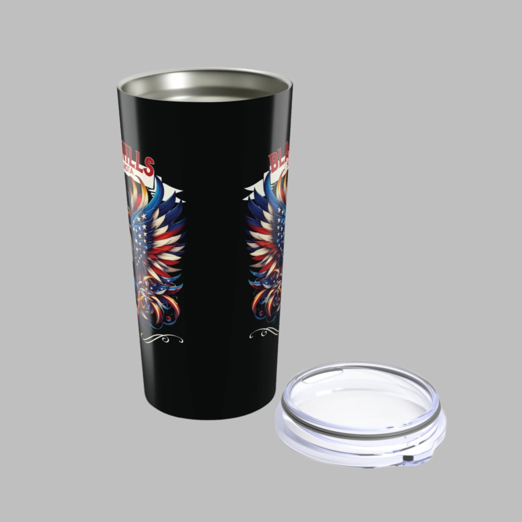 Black tumbler with colorful eagle design on a white background