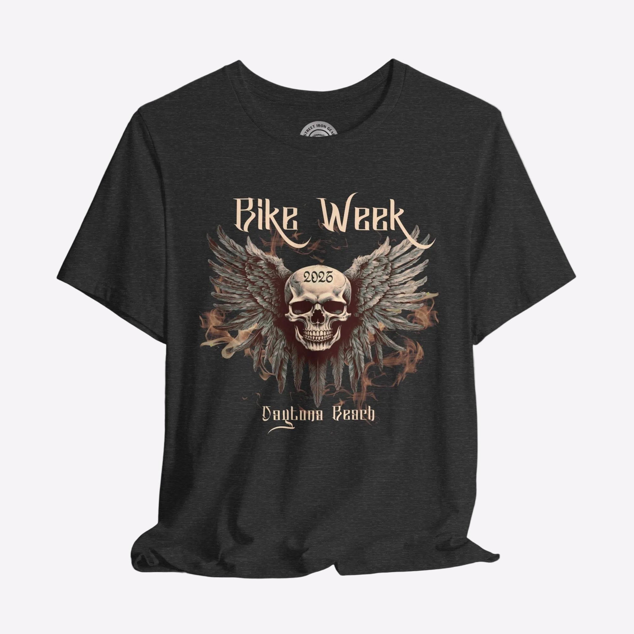 Black t-shirt with a skull and wings design on a gray background