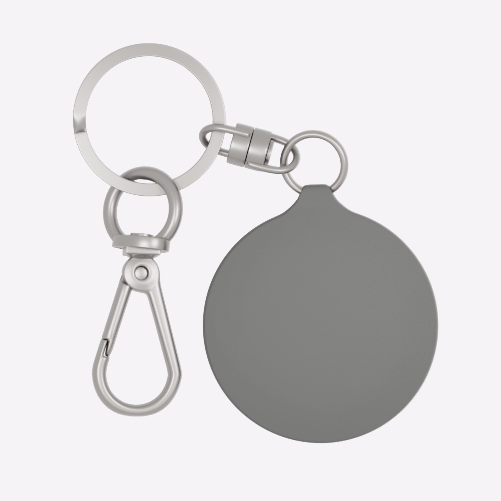 Silver keychain with a round tag on a white background