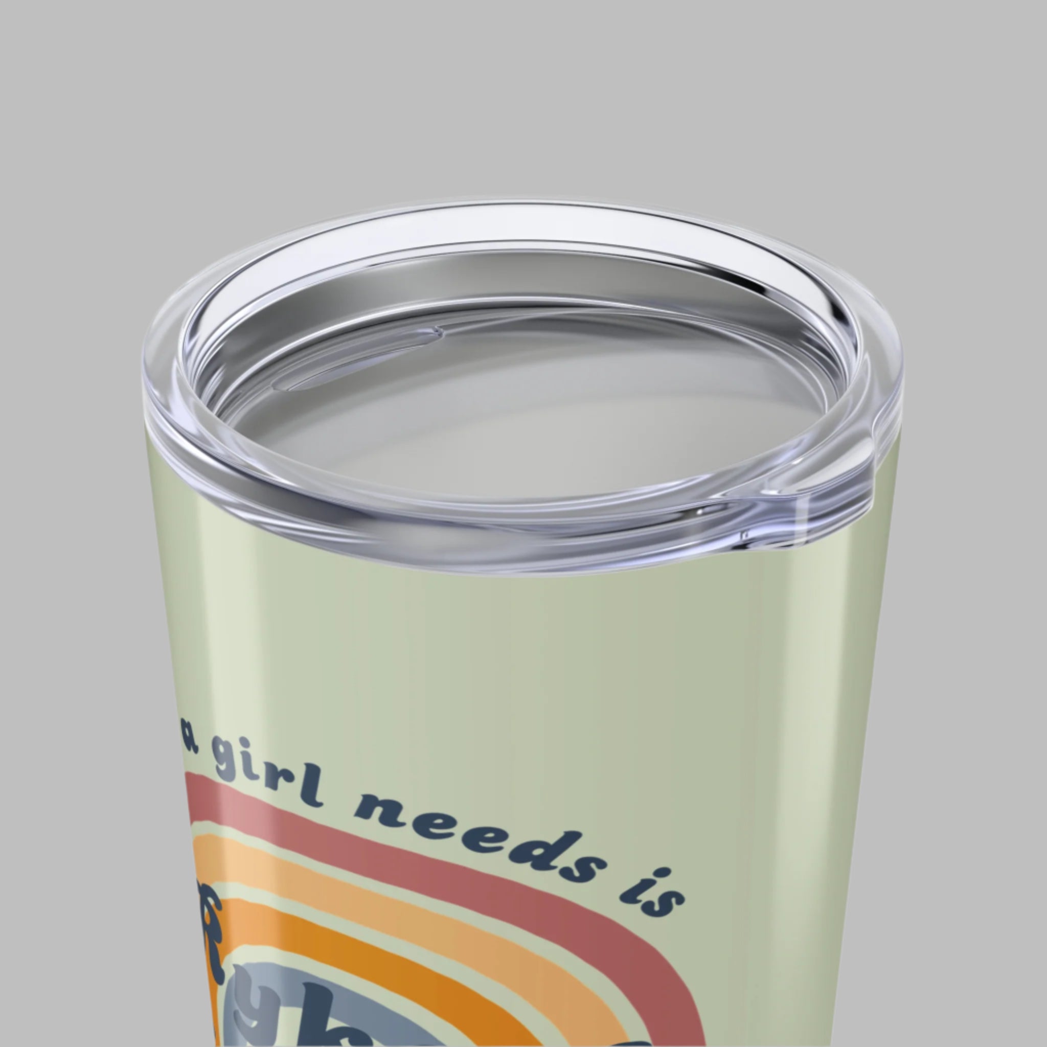 Tumbler with a colorful design and text on a white background