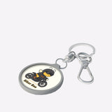 Keychain with a bear on a motorcycle design and 'Biker Bee' text on a white background