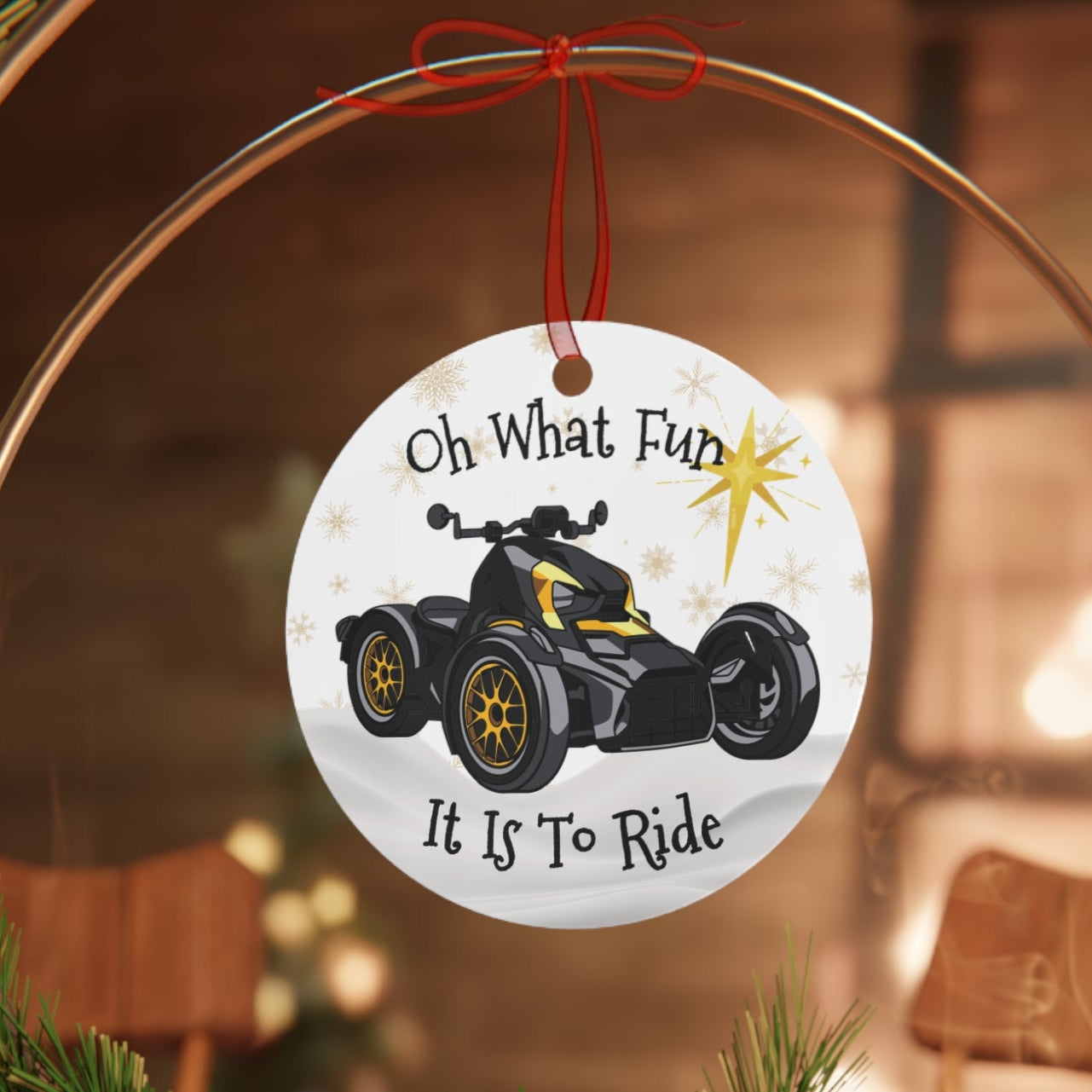 Decorative Christmas ornament with a four-wheeler graphic and text on a table setting.