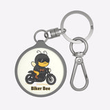 Keychain with a cartoon bee on a motorcycle design, labeled 'Biker Bee'.