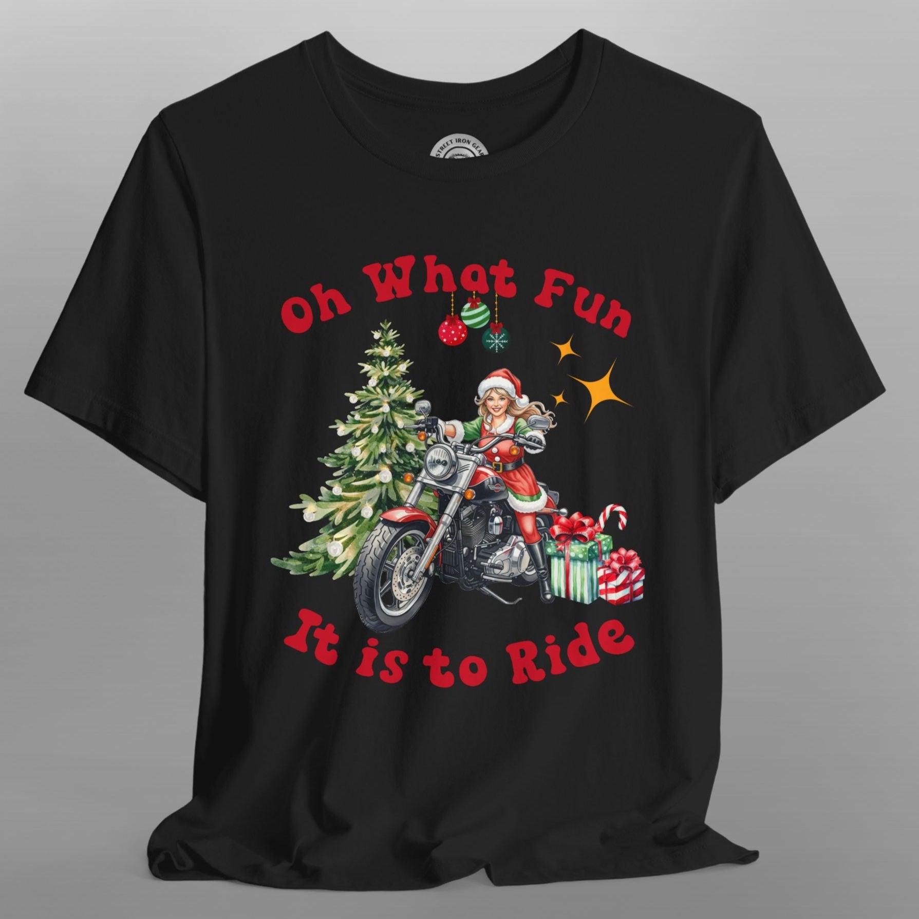 Black t-shirt with Christmas-themed design featuring a person on a motorcycle, tree, and presents.
