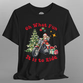 Black t-shirt with Christmas-themed design featuring a person on a motorcycle, tree, and presents.