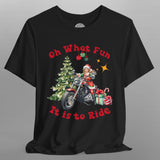 Black t-shirt with Christmas-themed design featuring a person on a motorcycle, tree, and presents.