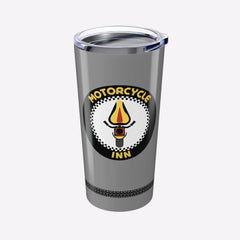 Silver tumbler with a motorcycle-themed label on a white background