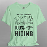 Light green t-shirt with black text and graphics on a gray background