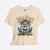 Beige t-shirt with 'Bike Week 2026 Daytona Beach' graphic design on a gray background