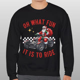 Person wearing a black sweatshirt with Santa Claus graphic and text on a gray background