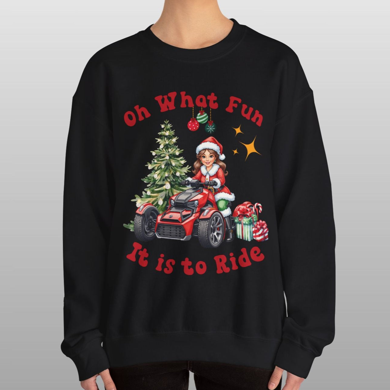 Person wearing a black sweatshirt with Christmas-themed design and text.