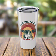 White tumbler with 'motorcycles and sunshine' text design on a white background