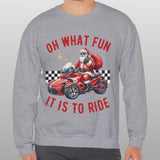 Person wearing a gray sweatshirt with Santa Claus on a motorcycle graphic and text.