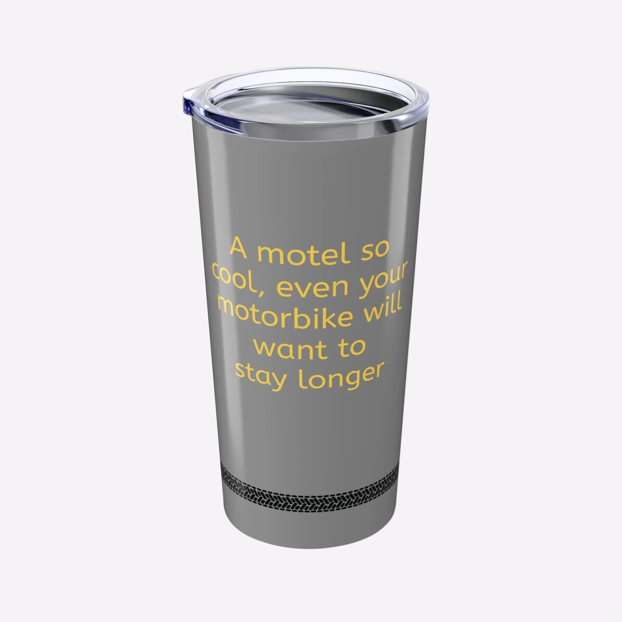 Gray tumbler with yellow text on a white background