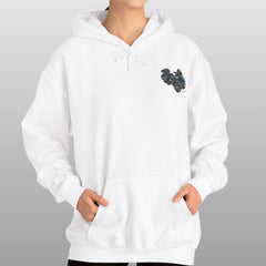 Person wearing a white hoodie with a small black logo on a gray background