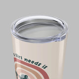 Tumbler with a colorful design and text on a white background