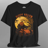 Black t-shirt with Halloween-themed design featuring a pumpkin and text on a gray background