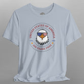 Light blue t-shirt with an eagle graphic and text on a gray background