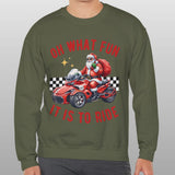 Person wearing a green sweatshirt with a graphic of Santa Claus on a motorcycle and text.