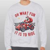 Person wearing a gray sweatshirt with a graphic design and text on a plain background