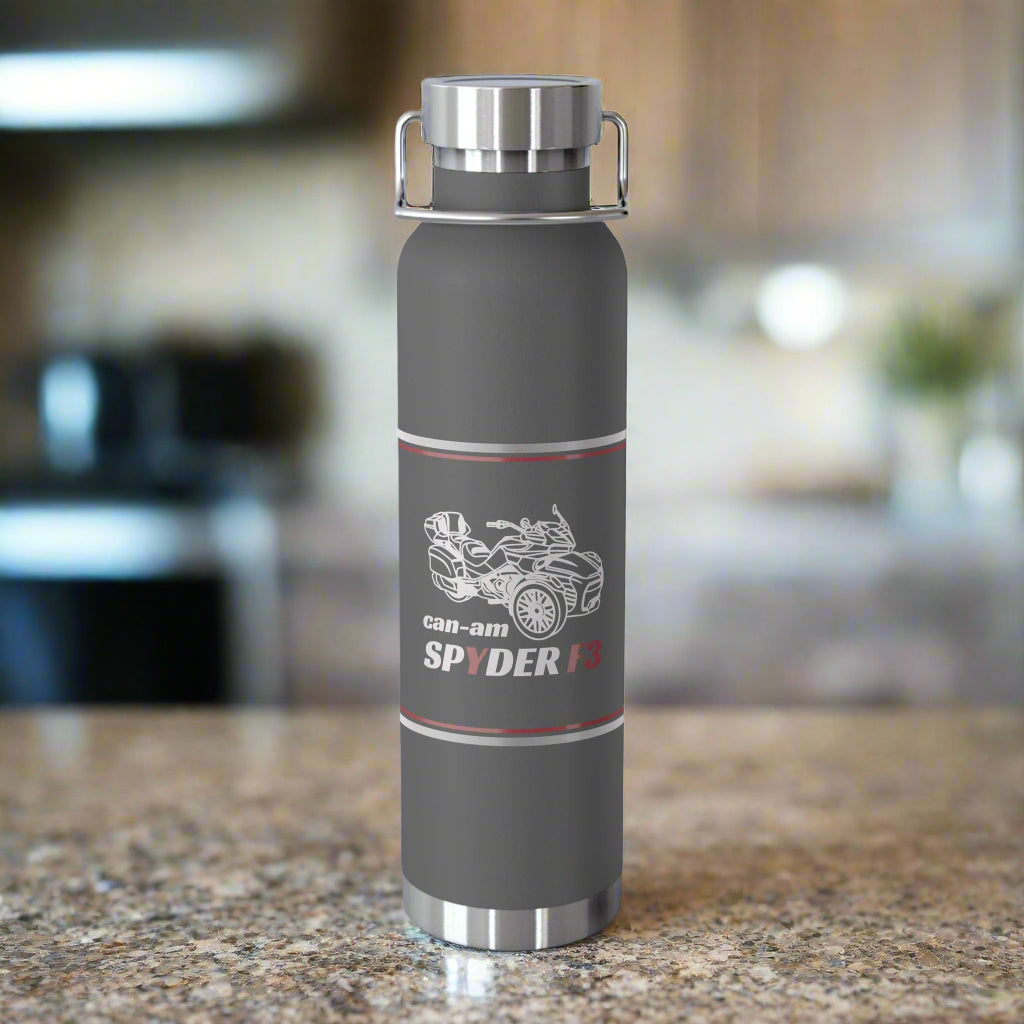 Gray water bottle with 'can-am Spyder' design on a white background