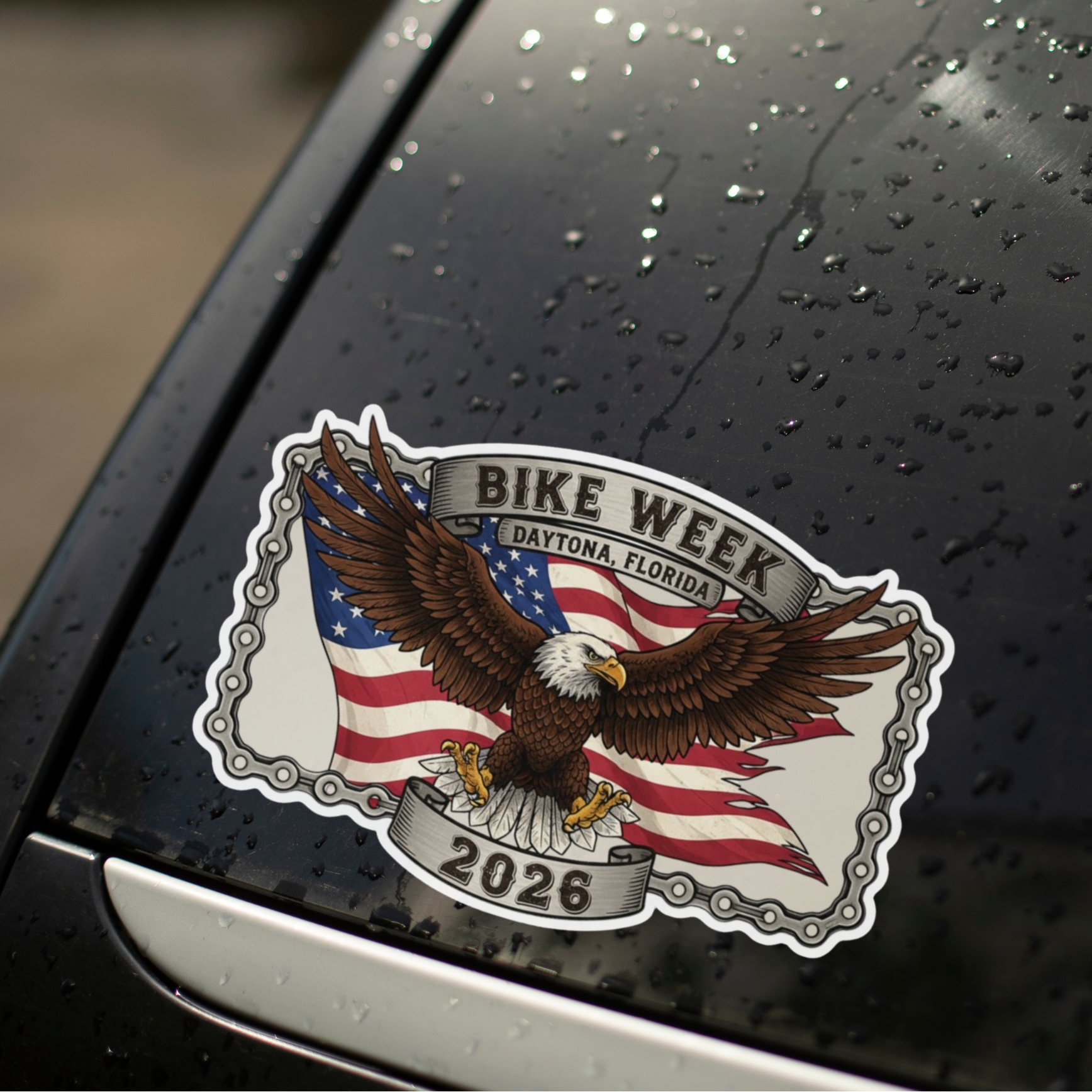 Bike Week Daytona Beach 2026 decal on a wet car window