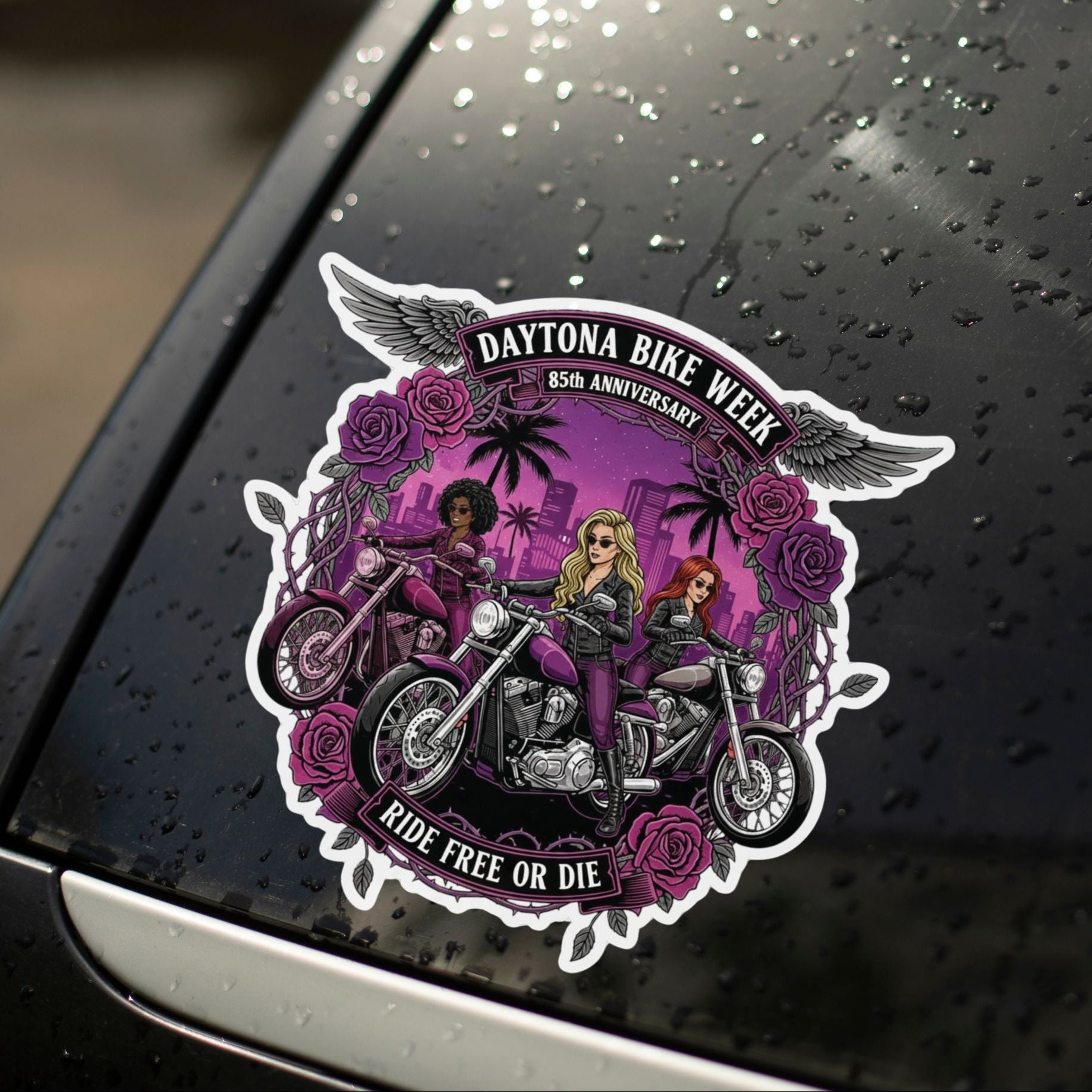 Car window with a Daytona Bike Week sticker featuring people on motorcycles and palm trees.