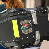 Black storage box with a 'Daytona Bike Week' logo on a blurred background