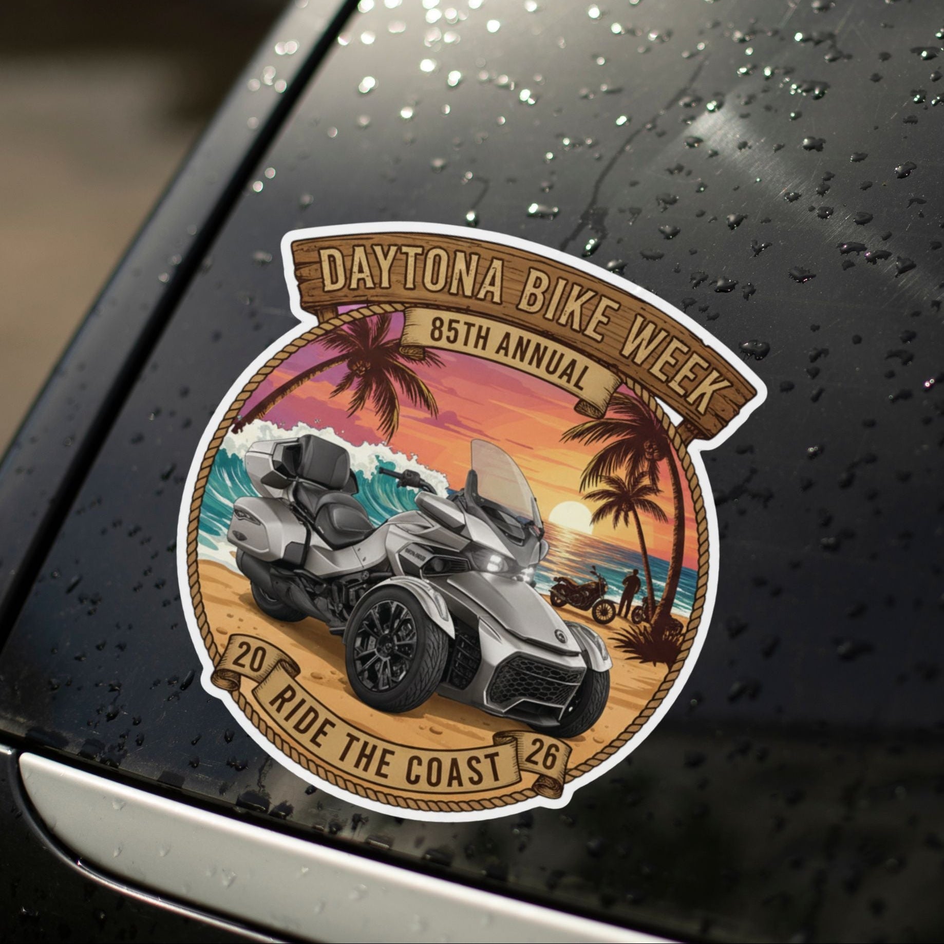 Daytona Bike Week sticker on a car window with raindrops.