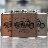Three customized laser engraved flasks with leather covering, each with a motorcycle design and personalized text.