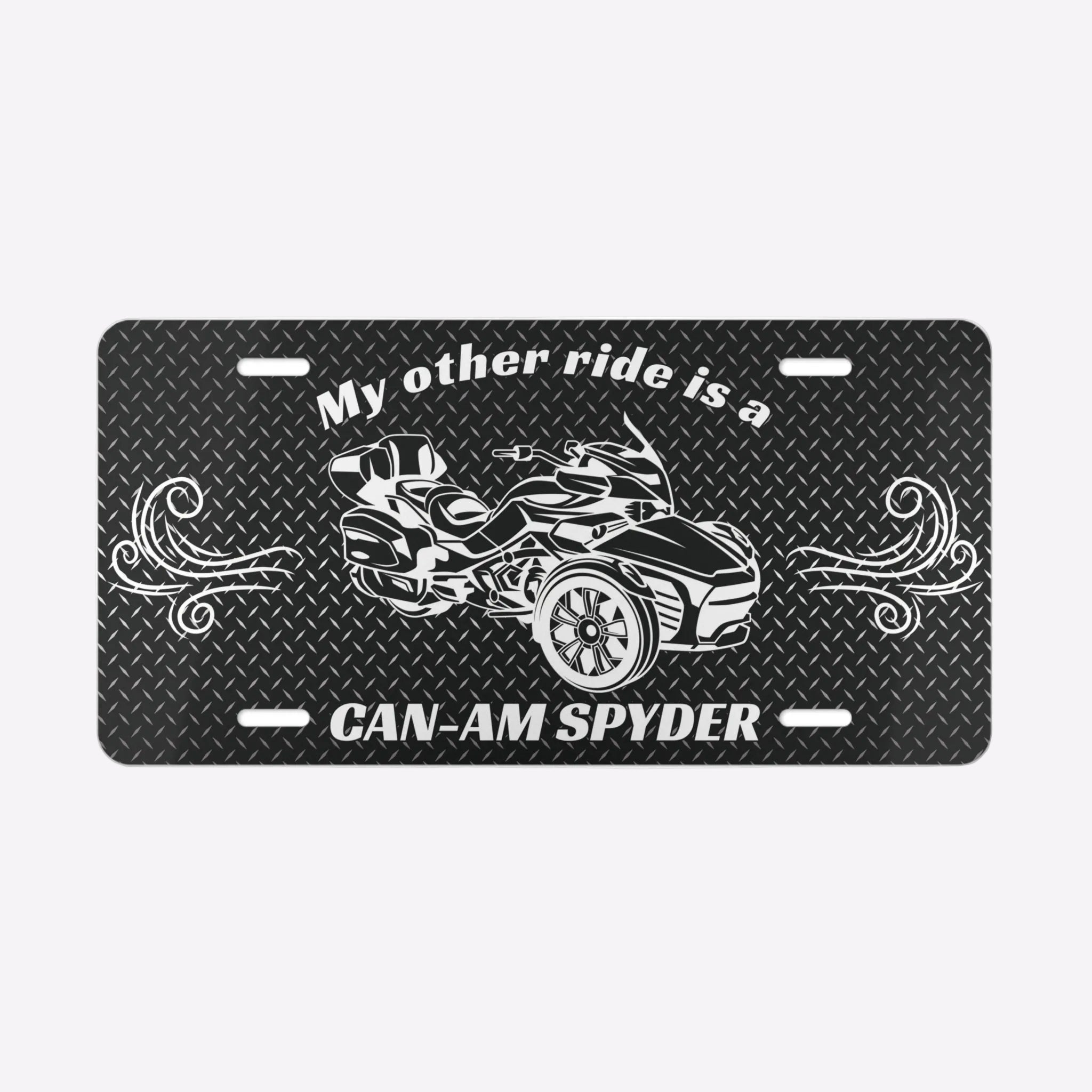 License plate with a graphic of a Can-Am Spyder and text on a black background
